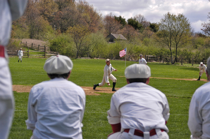 19th Century Base Ball at Old Bethpage Village Restoration. 2007 NY/NJ Cup - 4/29/07. Eric “Express” Miklich pitches the Mutuals of New York to a 15-0 victory over the Neshanock Club of Flemington, New Jersey in an 1864 match. The Gotham of New York Club and Washington of Mineola Club (NY) also competed at Old Bethpage Village for the annual NY/NJ Cup which was won by the Mutuals. Photo courtesy of Ray Shaw.  Click photo to return to previous page.